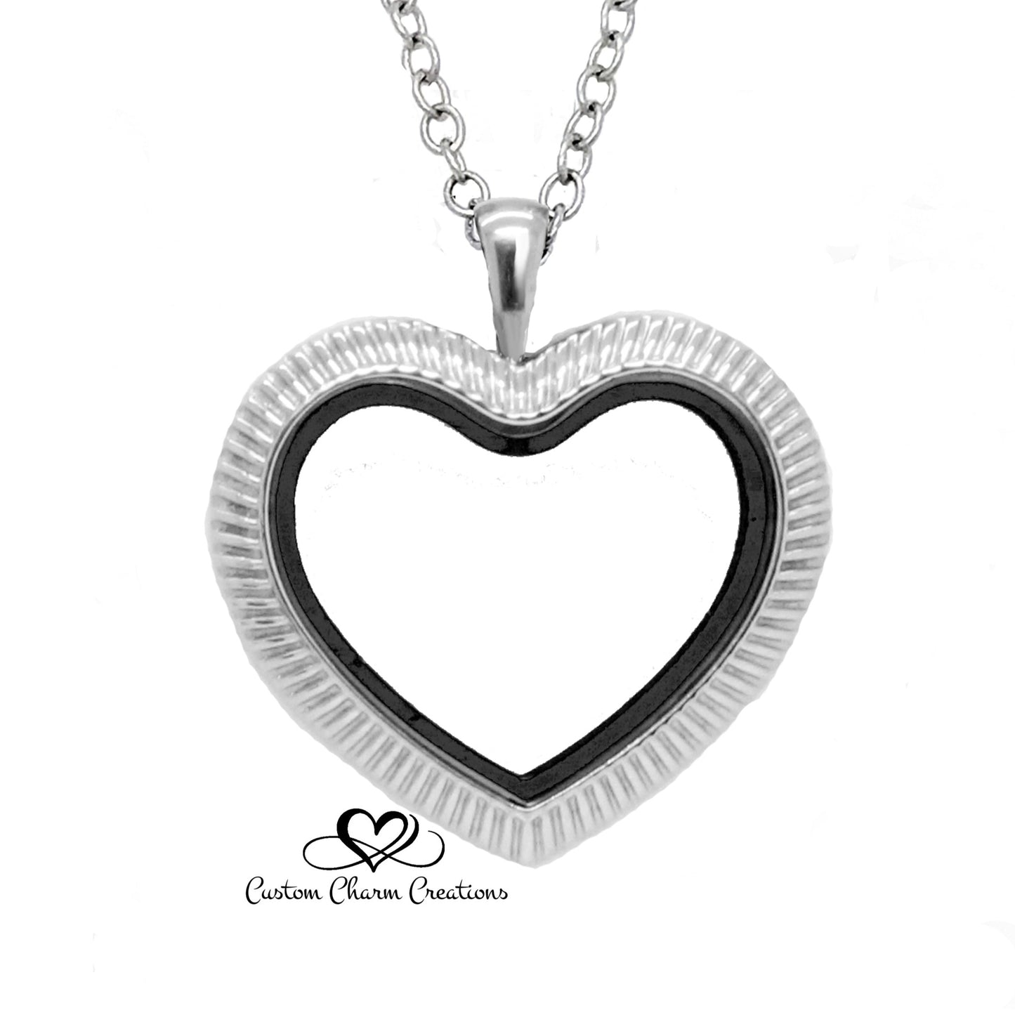 Floating Locket Heart Locket that is Magnetic and comes with a chain of your choice.